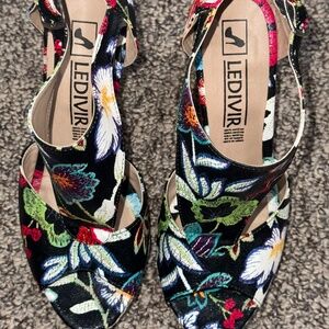 Black open toe sandal with colorful flowers